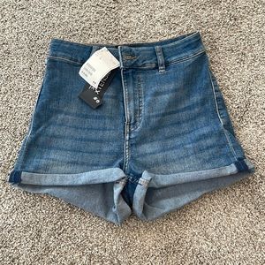 Never been worn blue high waisted shorts. H&M size 2